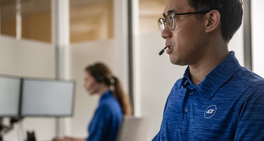 ADT professional in a monitoring station